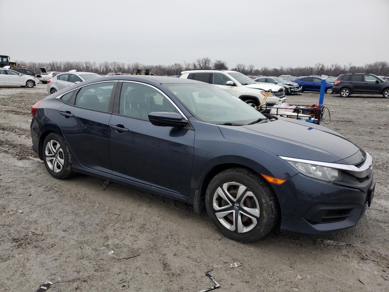 2018 Honda Civic VIN 19XFC2F57JE037622 Copart auction photo, side / minor dent/scratches damage thumbnail 4