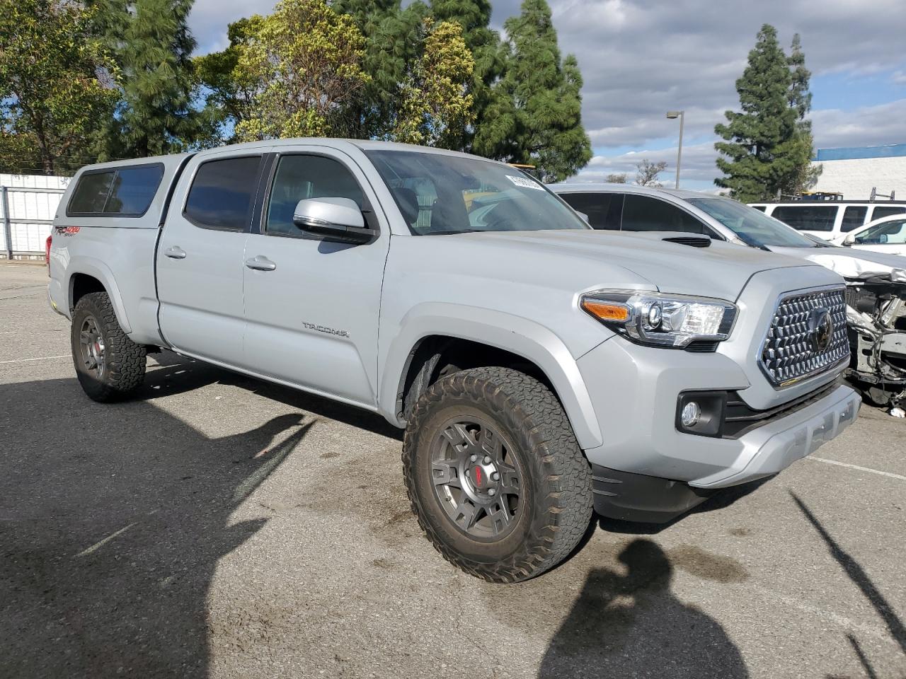 2018 Toyota Tacoma VIN 3TMDZ5BN7JM045741 Copart auction photo, rear end damage thumbnail 4