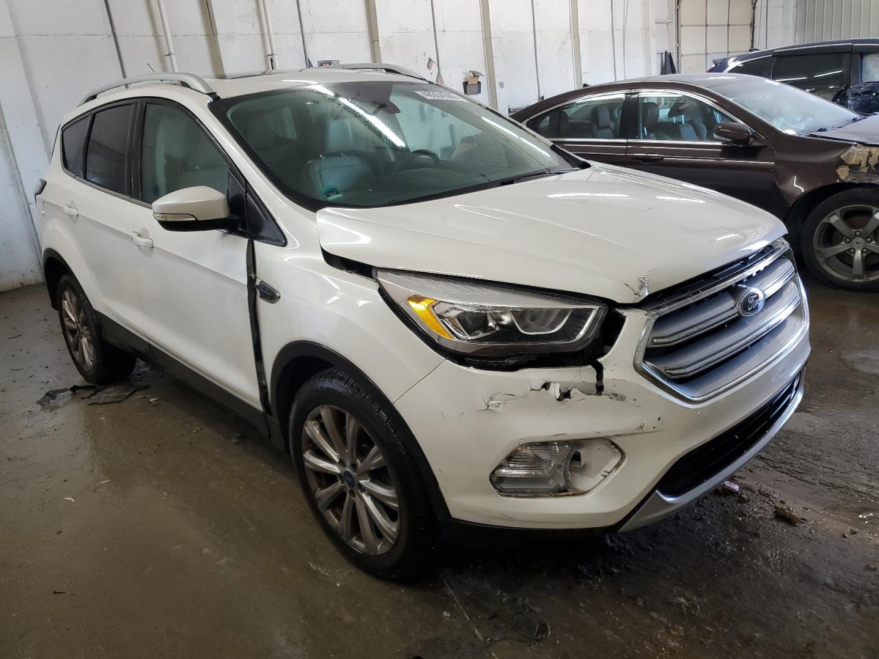 2017 Ford Escape VIN 1FMCU9J96HUE10272 Copart auction photo, rear end / front end damage thumbnail 4