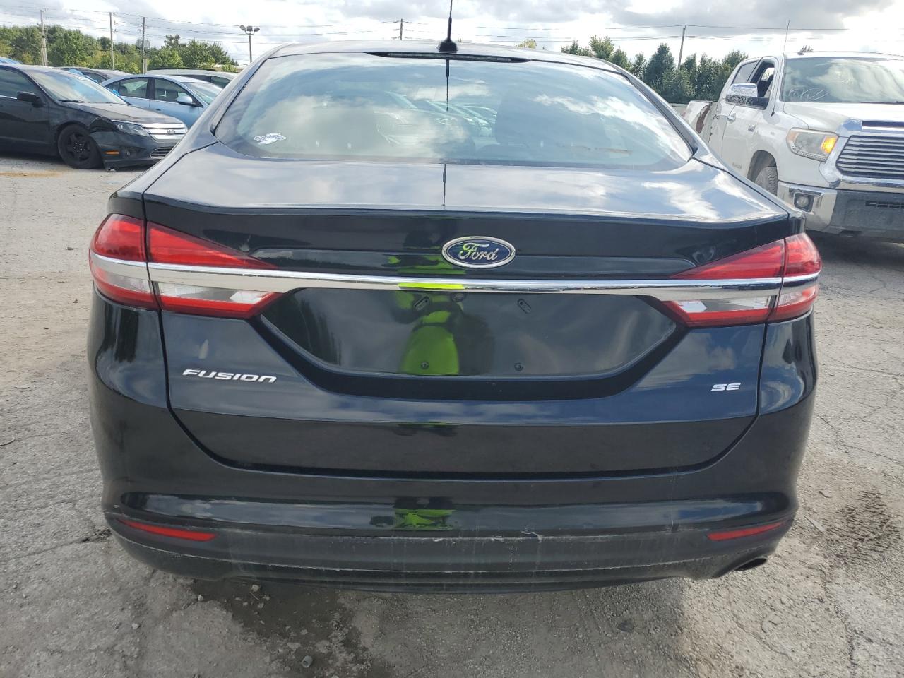 2017 Ford Focus VIN 1FADP3F23HL266605 Copart auction photo, rear end / minor dent/scratches damage thumbnail 6