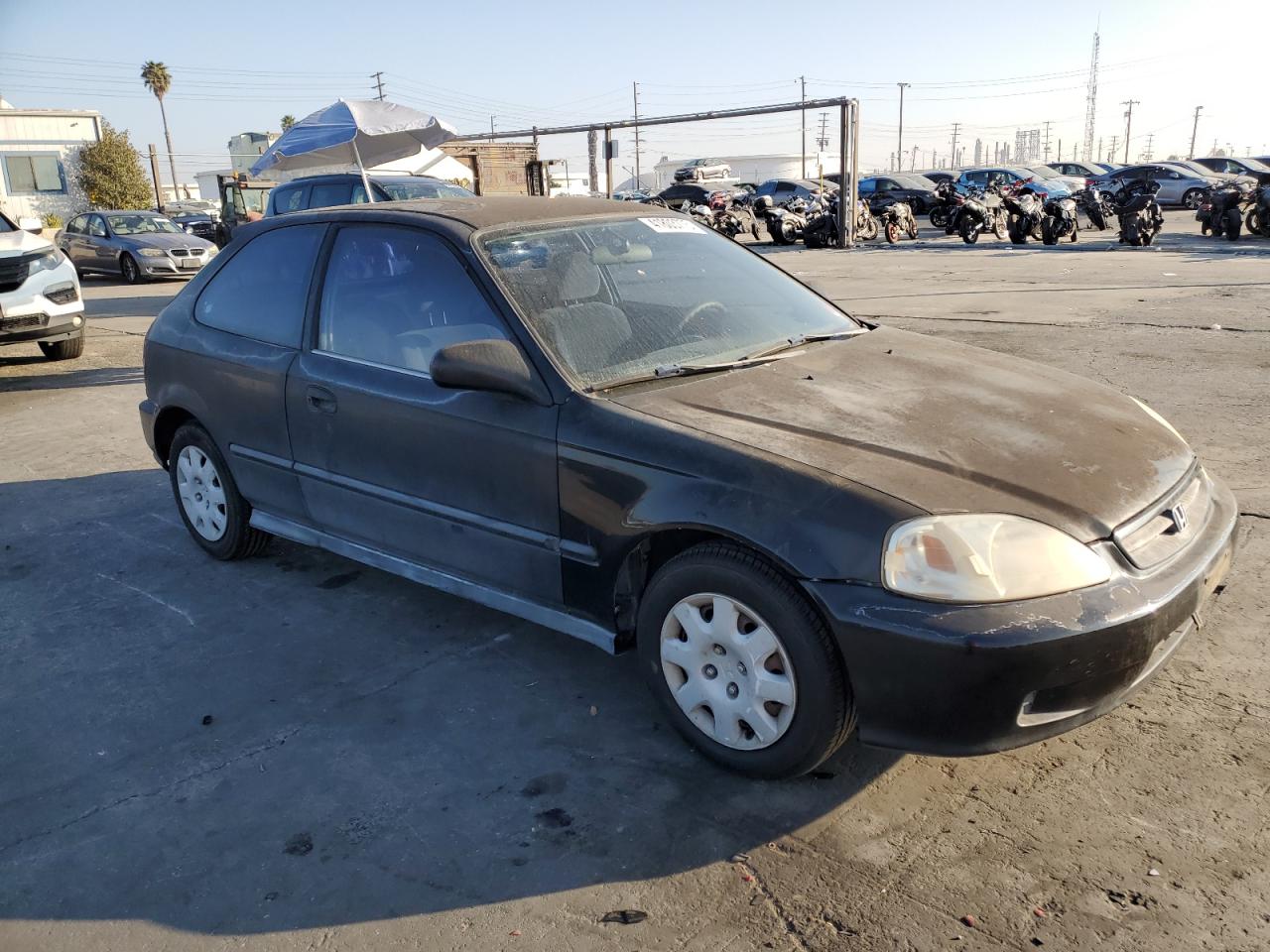 2000 Honda Civic VIN 2HGEJ6448YH111570 Copart auction photo, vandalism / minor dent/scratches damage thumbnail 4