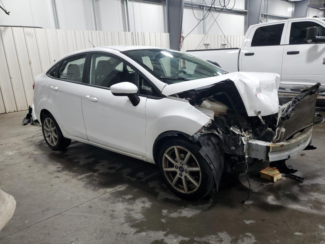 2019 Ford Fiesta VIN 3FADP4BJ6KM105268 Copart auction photo, front end / side damage thumbnail 4