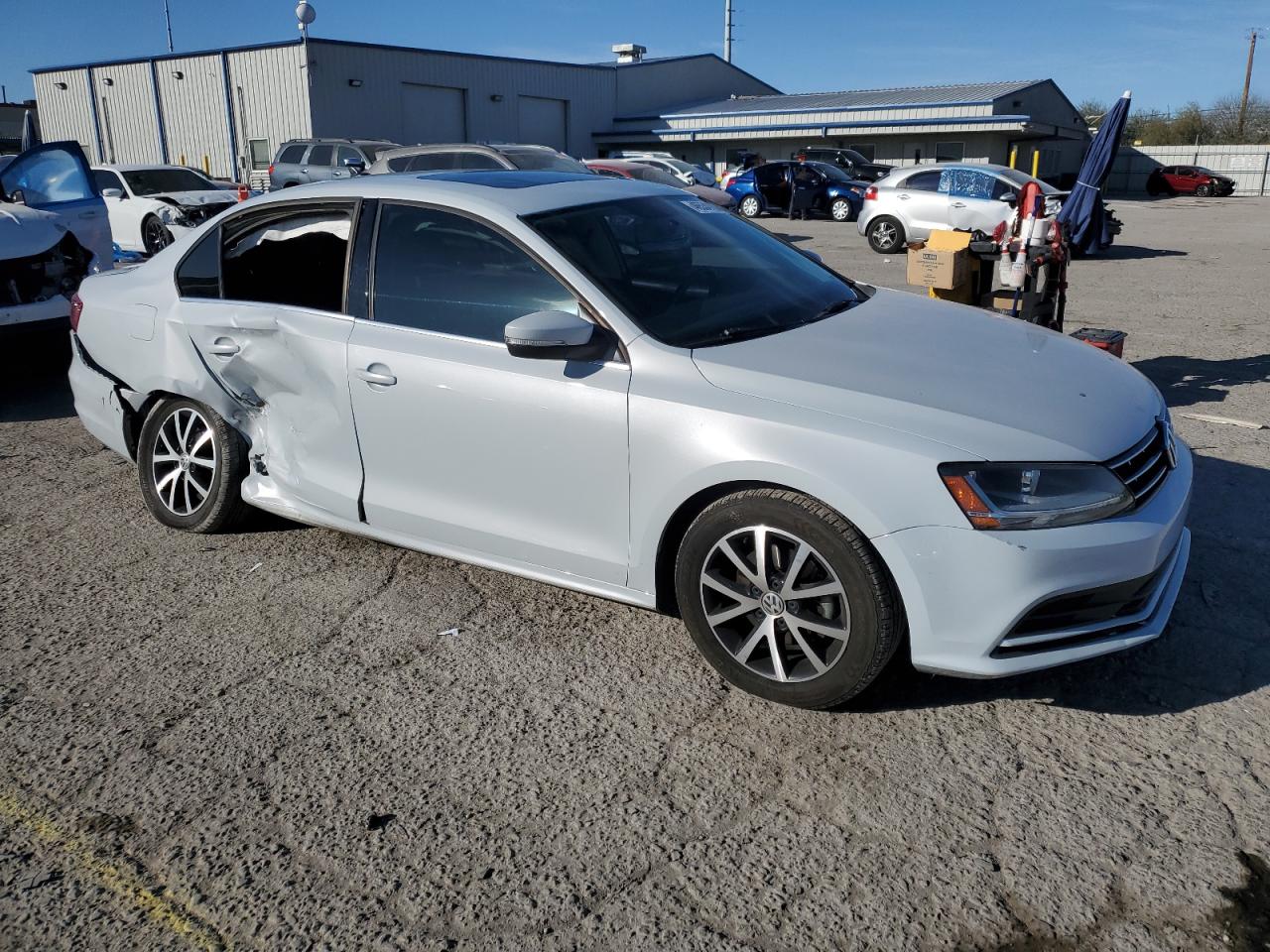 2018 Volkswagen Jetta VIN 3VWDB7AJ6JM259972 Copart auction photo, side / rear end damage thumbnail 4