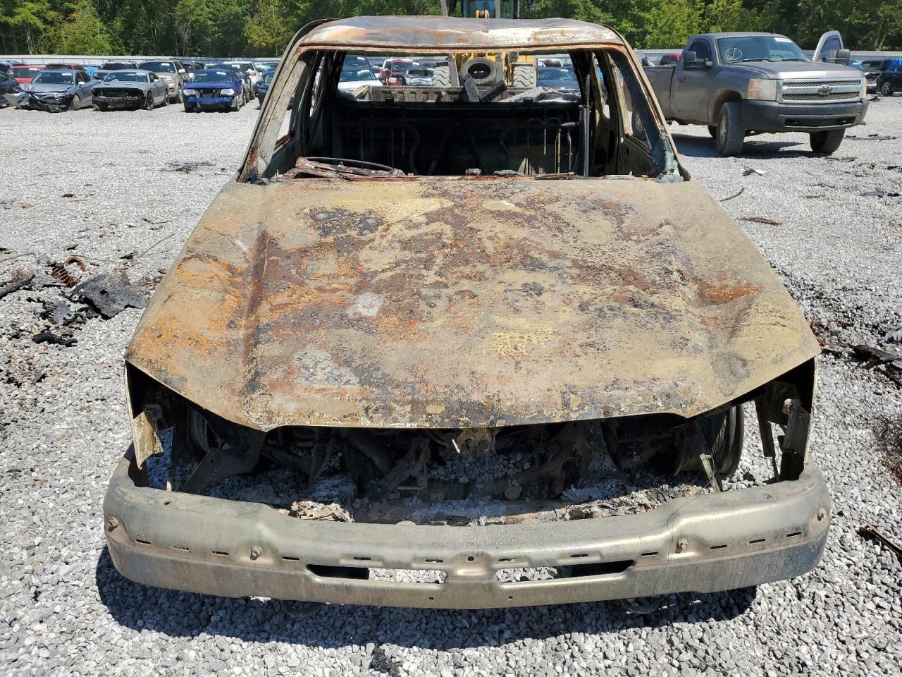 2004 Chevrolet Silverado VIN 2GCEC19V141171111 Copart auction photo, burn damage thumbnail 5