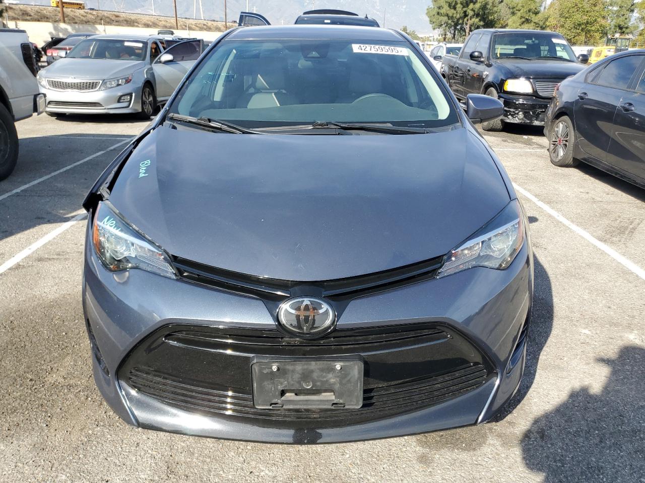2018 Toyota Corolla VIN 5YFBURHE4JP844664 Copart auction photo, side / front end damage thumbnail 5