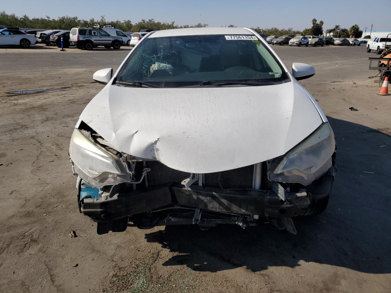 2015 Toyota Corolla VIN 5YFBURHE9FP317372 Copart auction photo, front end damage thumbnail 4