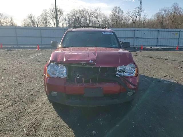 2010 Jeep Grand Cherokee VIN 1J4PR4GK1AC134190 Copart auction photo, front end / rear end damage thumbnail 11