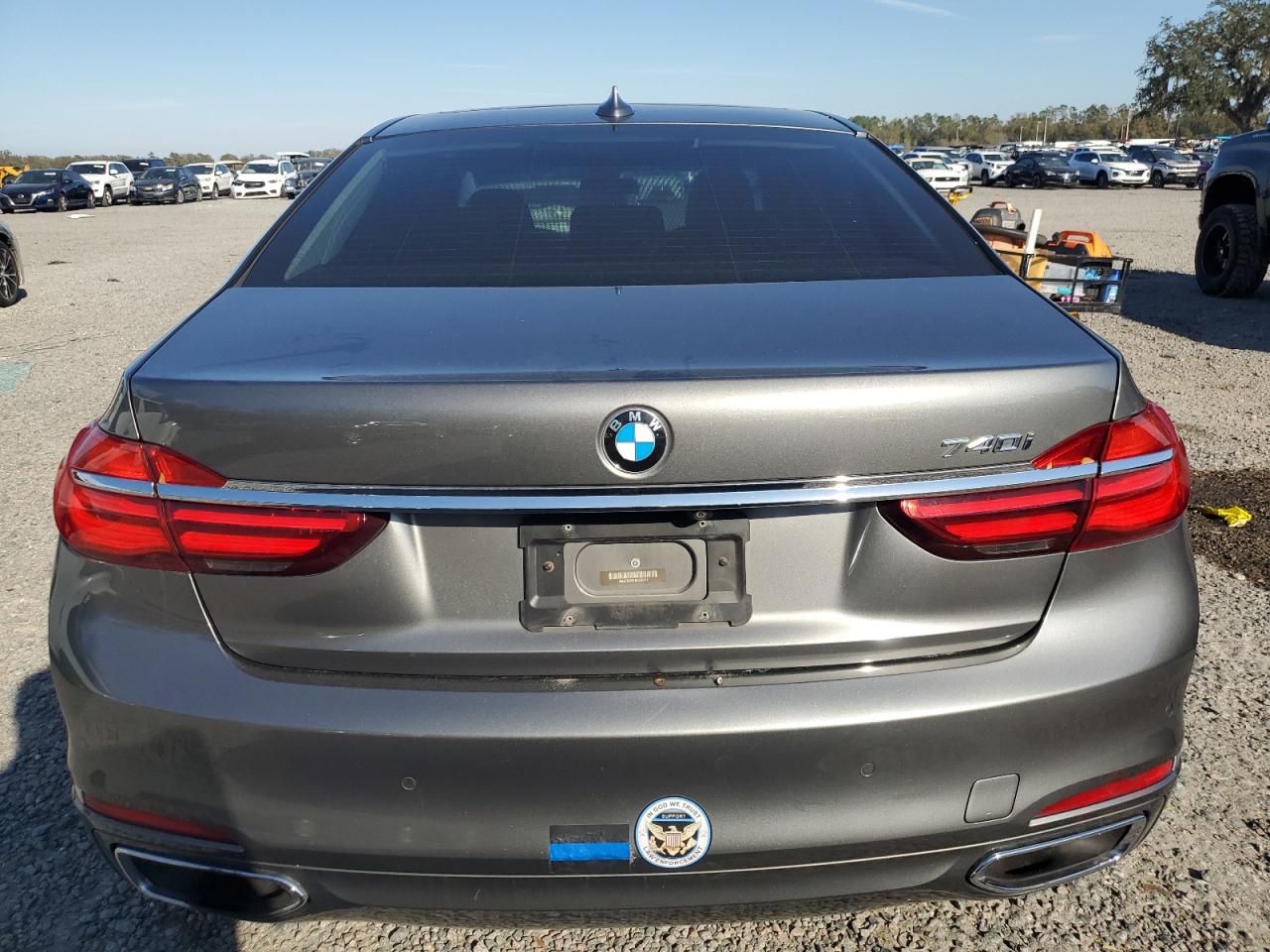 2016 BMW 7er VIN WBA7E2C51GG503912 Copart auction photo, side damage thumbnail 6