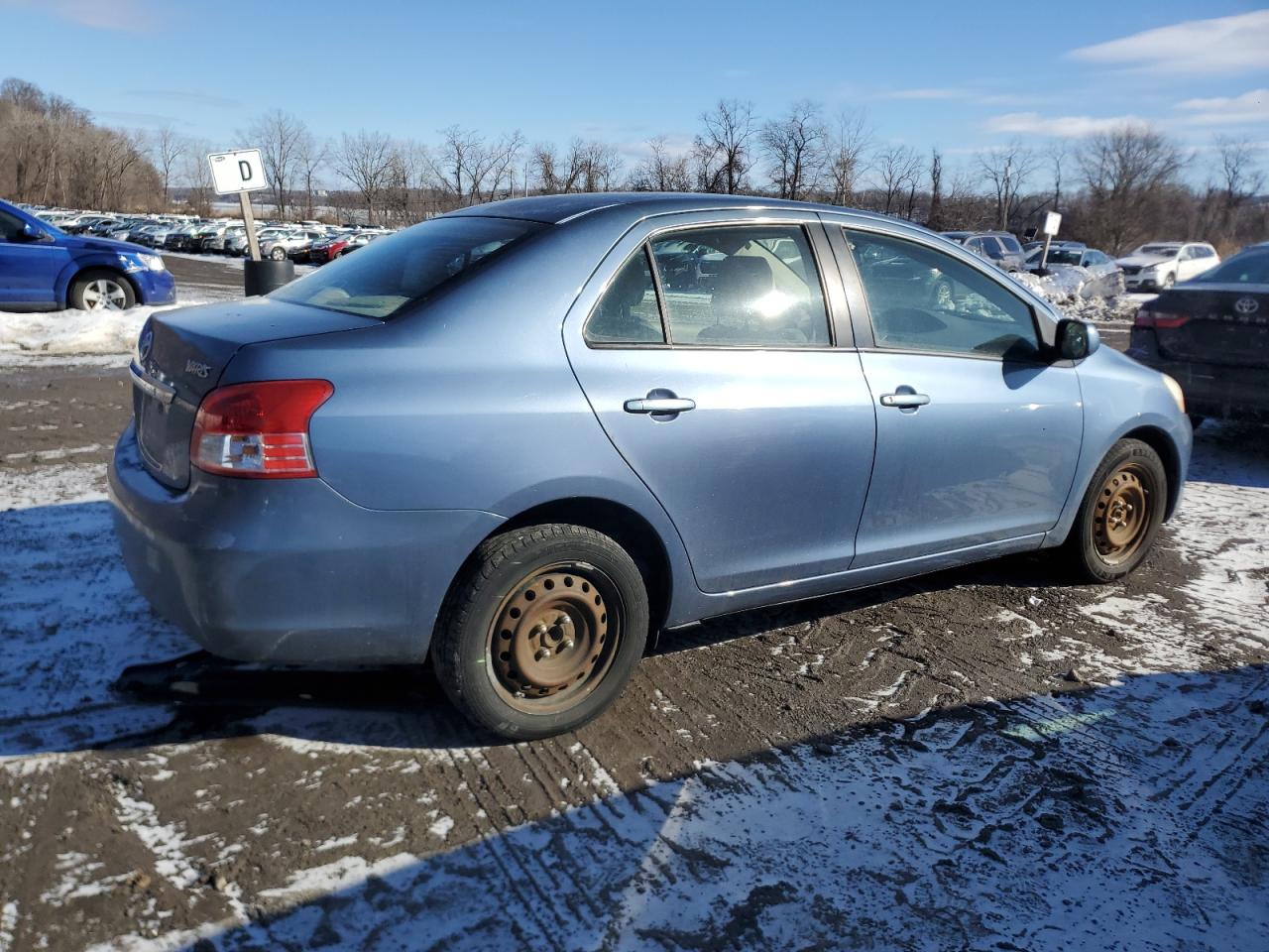 2011 Toyota Yaris VIN JTDBT4K34B1403393 Copart auction photo, minor dent/scratches damage thumbnail 3