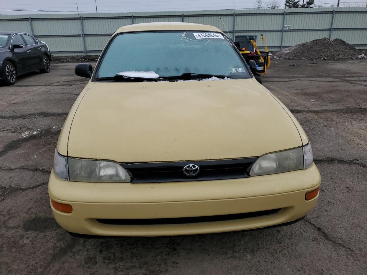 1995 Toyota Corolla VIN 1NXAE09B6SZ249422 Copart auction photo, side damage thumbnail 5
