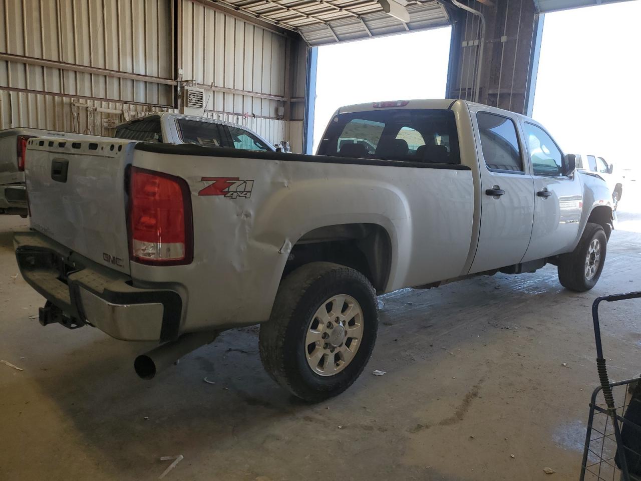 2011 GMC Sierra VIN 1GT120C85BF236871 Copart auction photo, front end / hail damage thumbnail 3