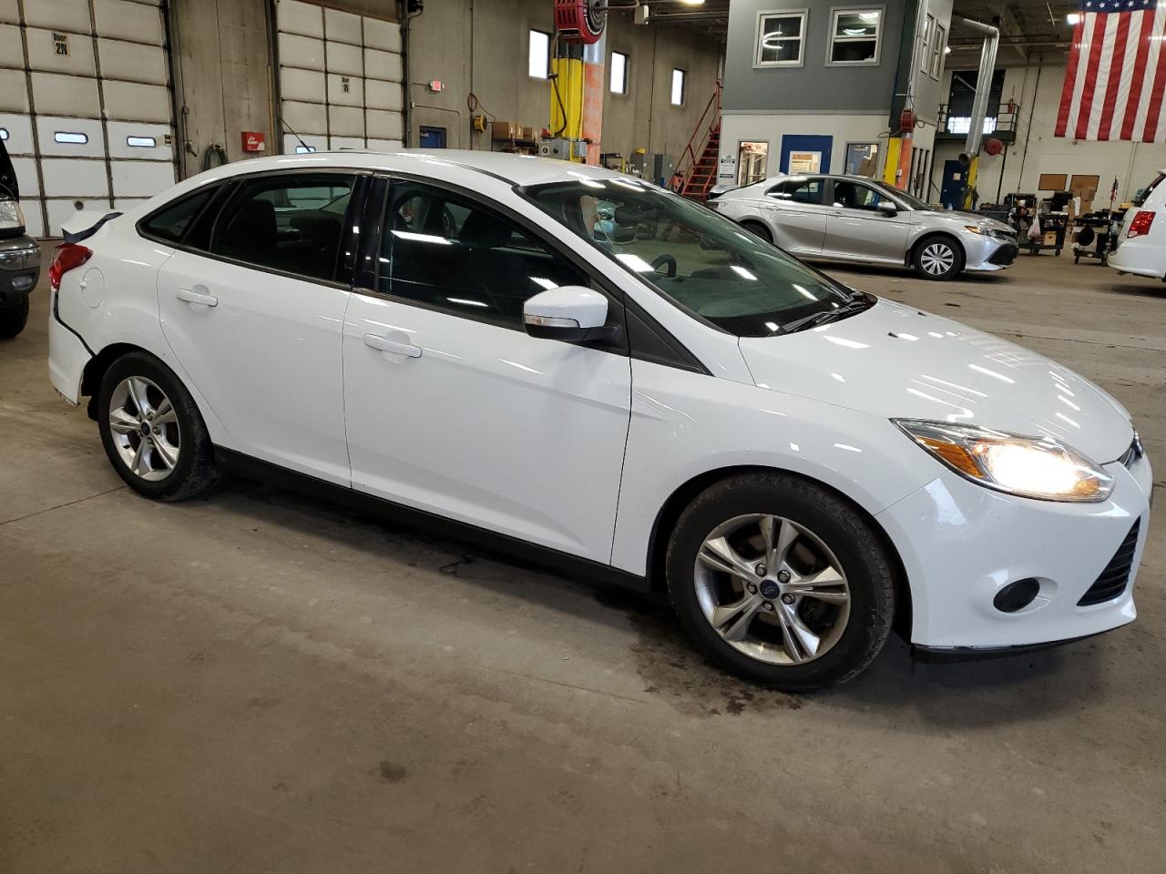 2014 Ford Focus VIN 1FADP3F21EL198185 Copart auction photo, all over damage thumbnail 4