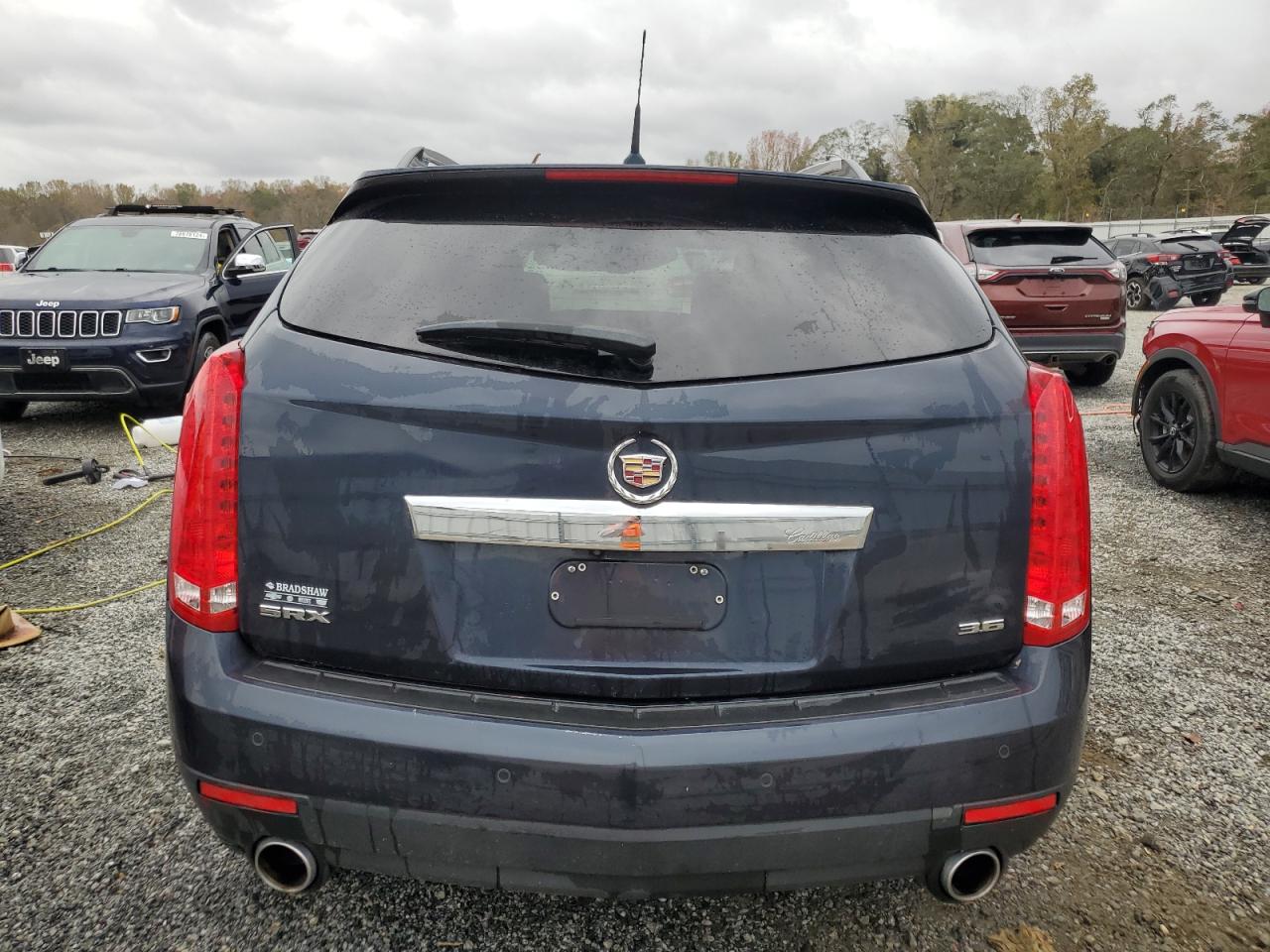 2014 Cadillac SRX VIN 3GYFNBE35ES677503 Copart auction photo, front end damage thumbnail 6