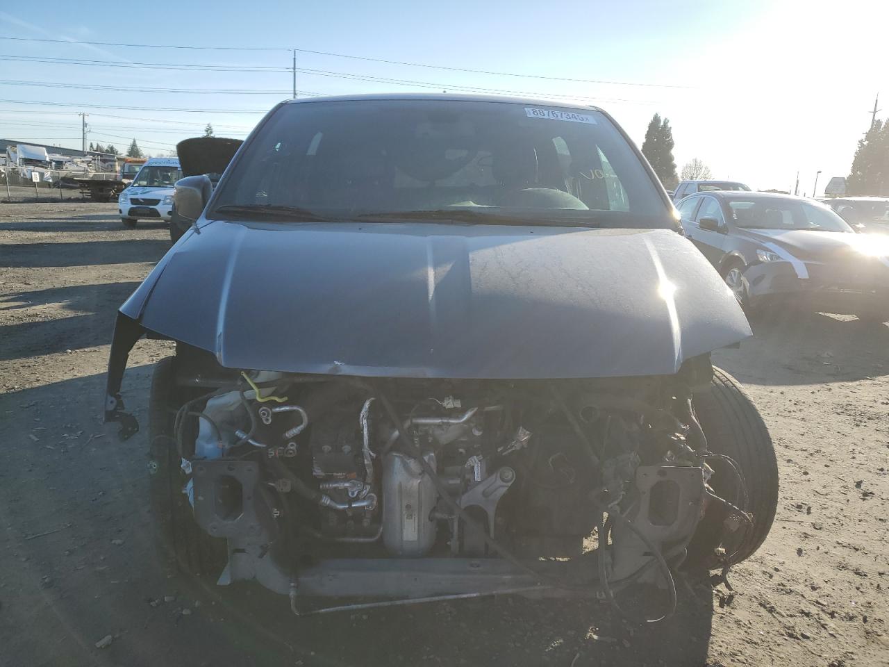 2019 Dodge Caravan VIN 2C4RDGEG1KR707031 Copart auction photo, front end / side damage thumbnail 5