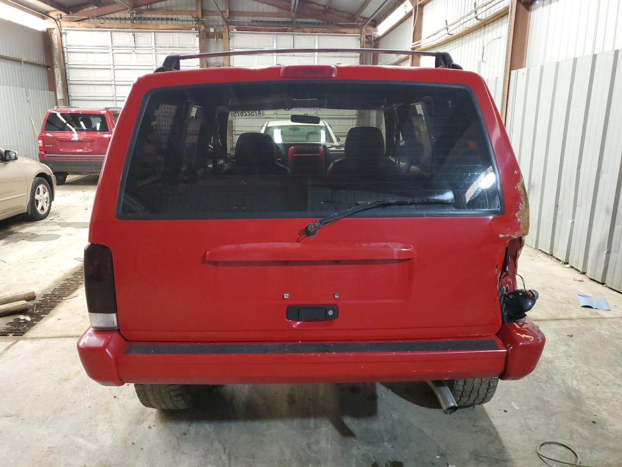 1999 Jeep Grand Cherokee VIN 1J4FF68S4XL661115 Copart auction photo, rear end damage thumbnail 6