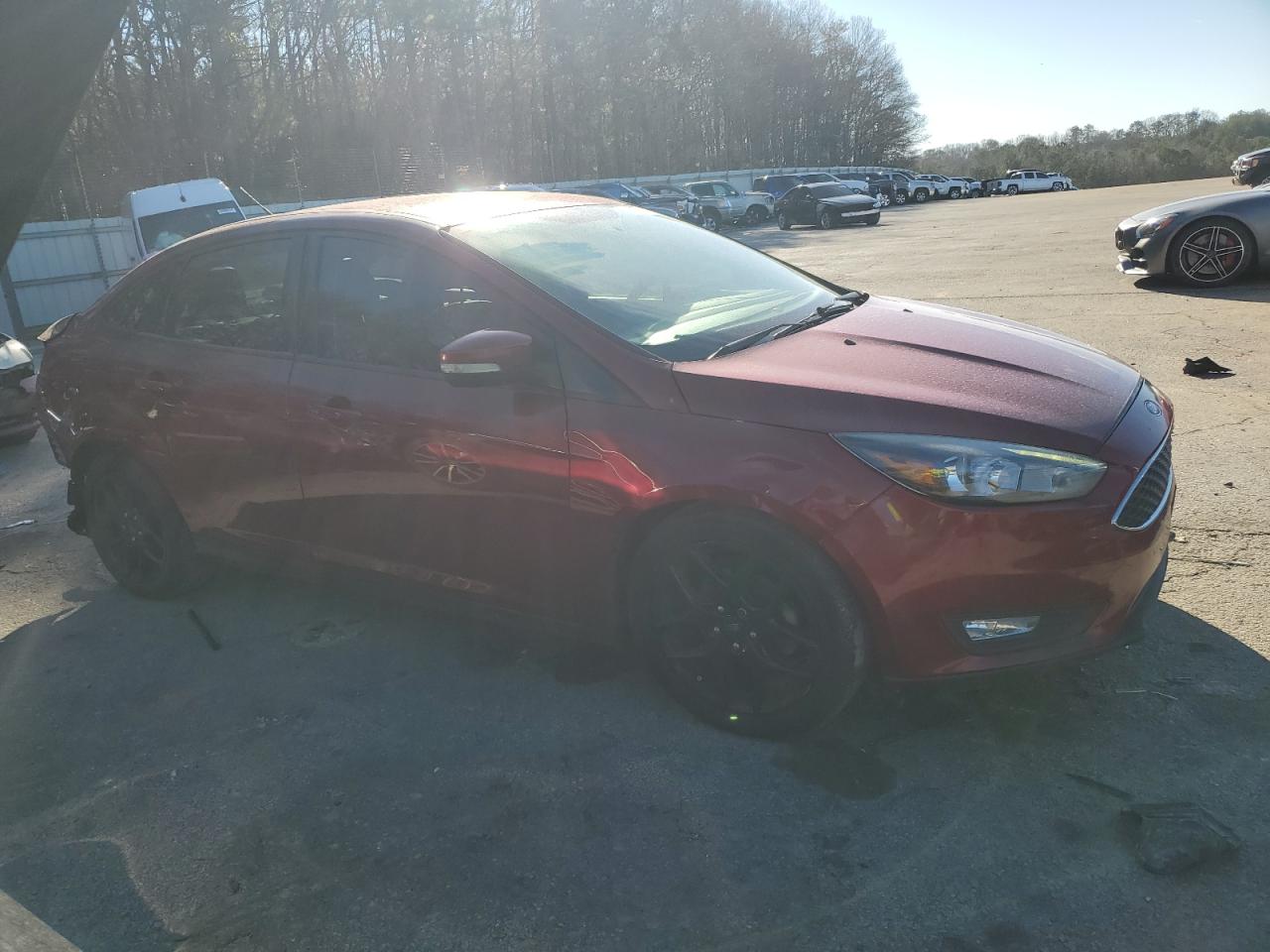 2016 Ford Focus VIN 1FADP3F2XGL397397 Copart auction photo, rear end damage thumbnail 4