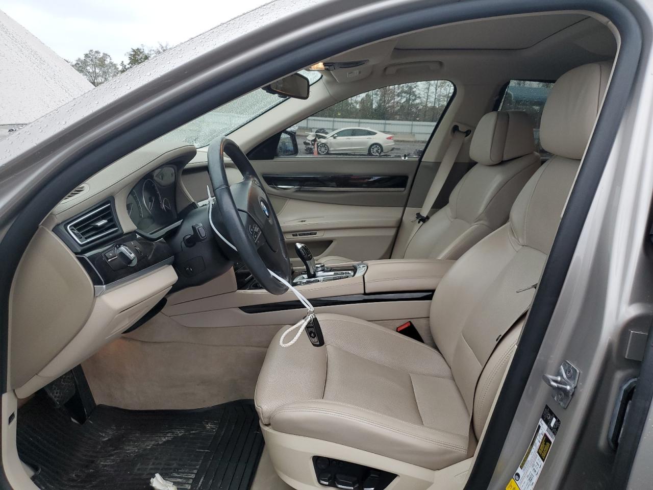 2011 BMW 7er VIN WBAKB8C51BC852199 Copart auction photo, front end / side damage thumbnail 7