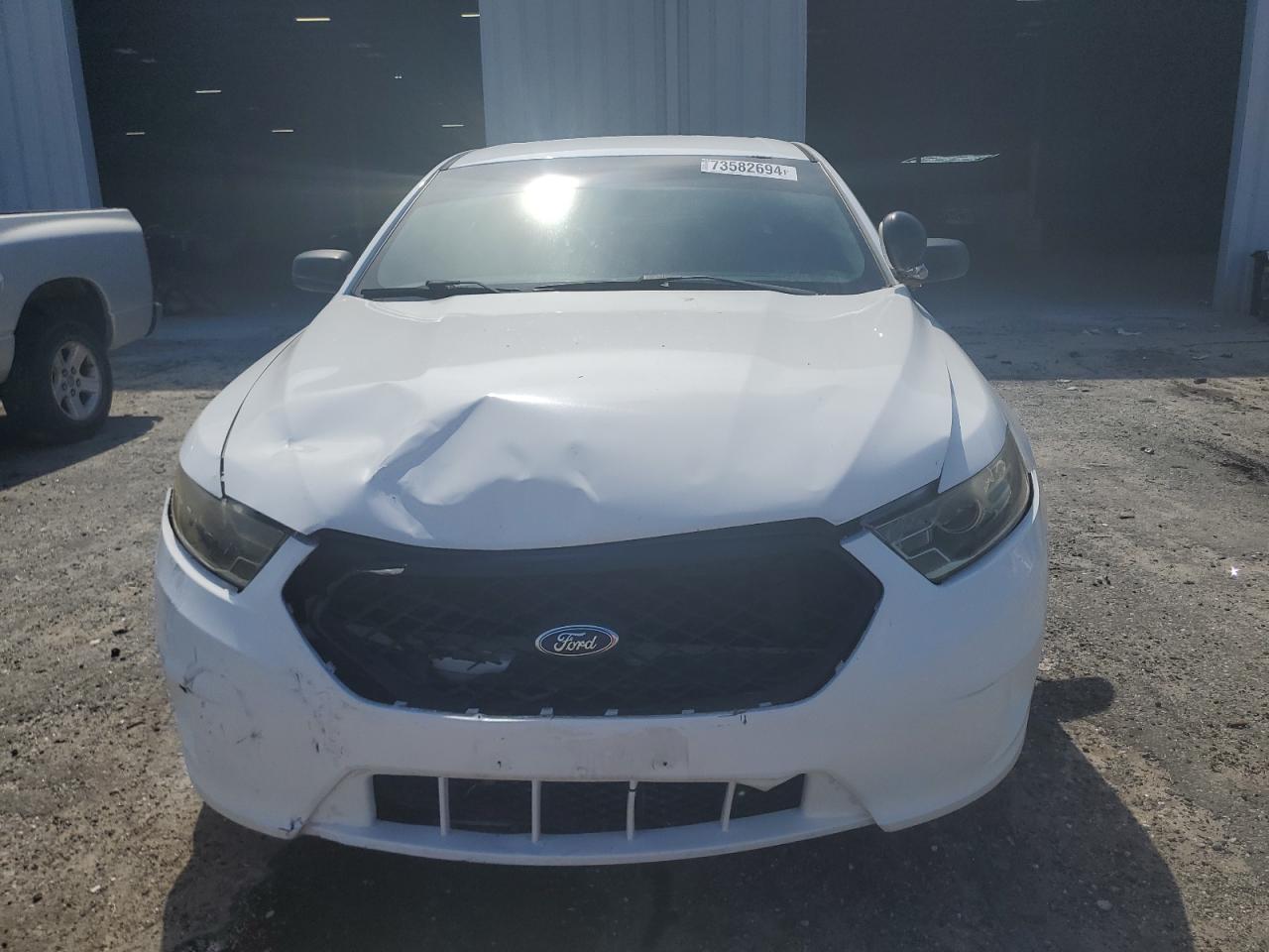 2013 Ford Taurus VIN 1FAHP2M82DG105913 Copart auction photo, front end damage thumbnail 5