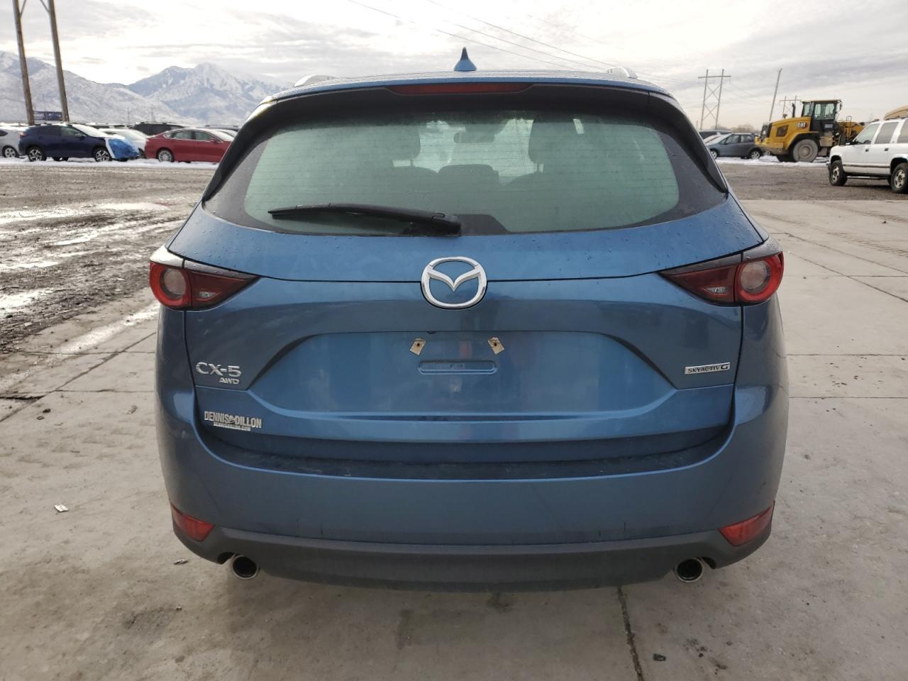 2021 Mazda CX-5 VIN JM3KFBBM1M0312215 Copart auction photo, side damage thumbnail 6