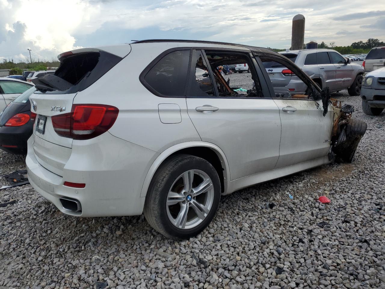 2015 BMW X5 VIN 5UXKR2C59F0H38990 Copart auction photo, burn damage thumbnail 3