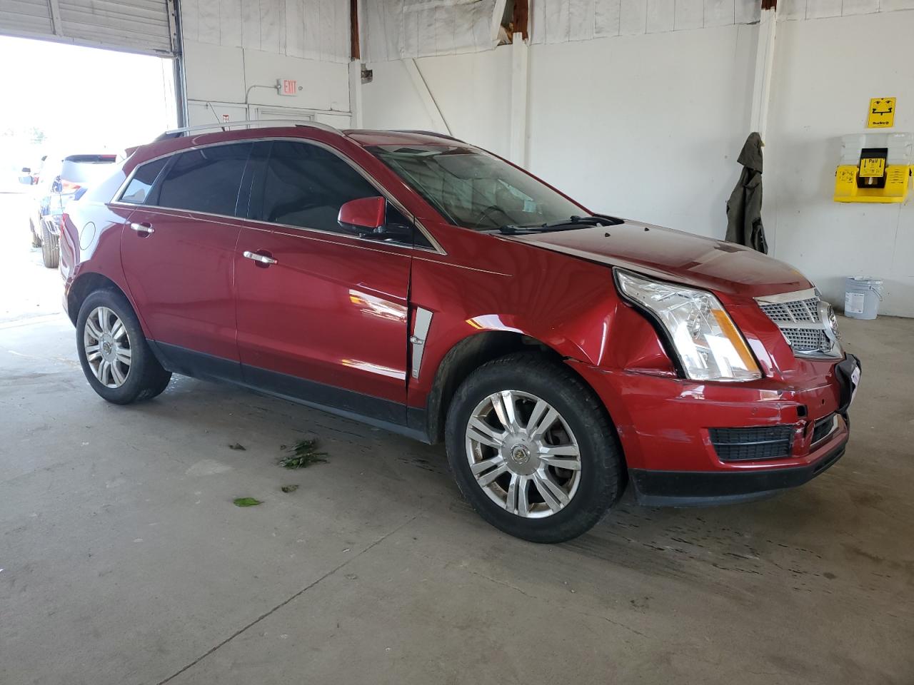 2012 Cadillac SRX VIN 3GYFNAE39CS645967 Copart auction photo, side / front end damage thumbnail 4