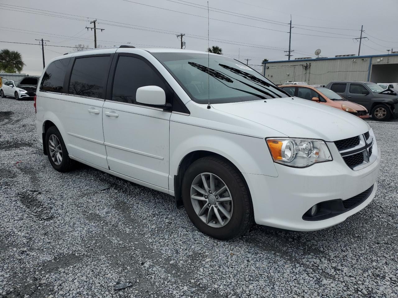 2015 Dodge Caravan VIN 2C4RDGCG3FR653255 Copart auction photo, water/flood damage thumbnail 4