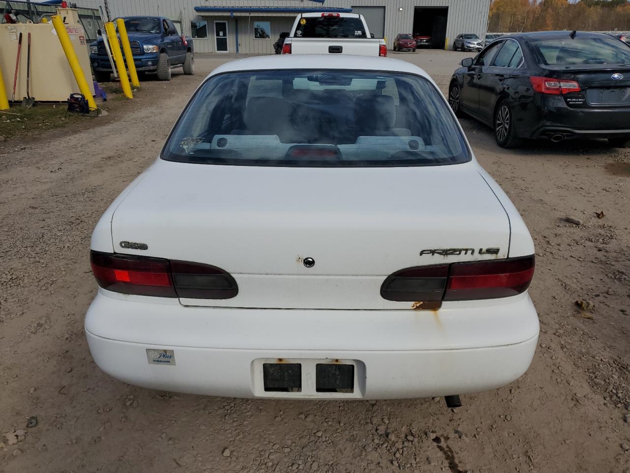 1996 GEO Prizm VIN 1Y1SK5261TZ028032 Copart auction photo, normal wear / minor dent/scratches damage thumbnail 6