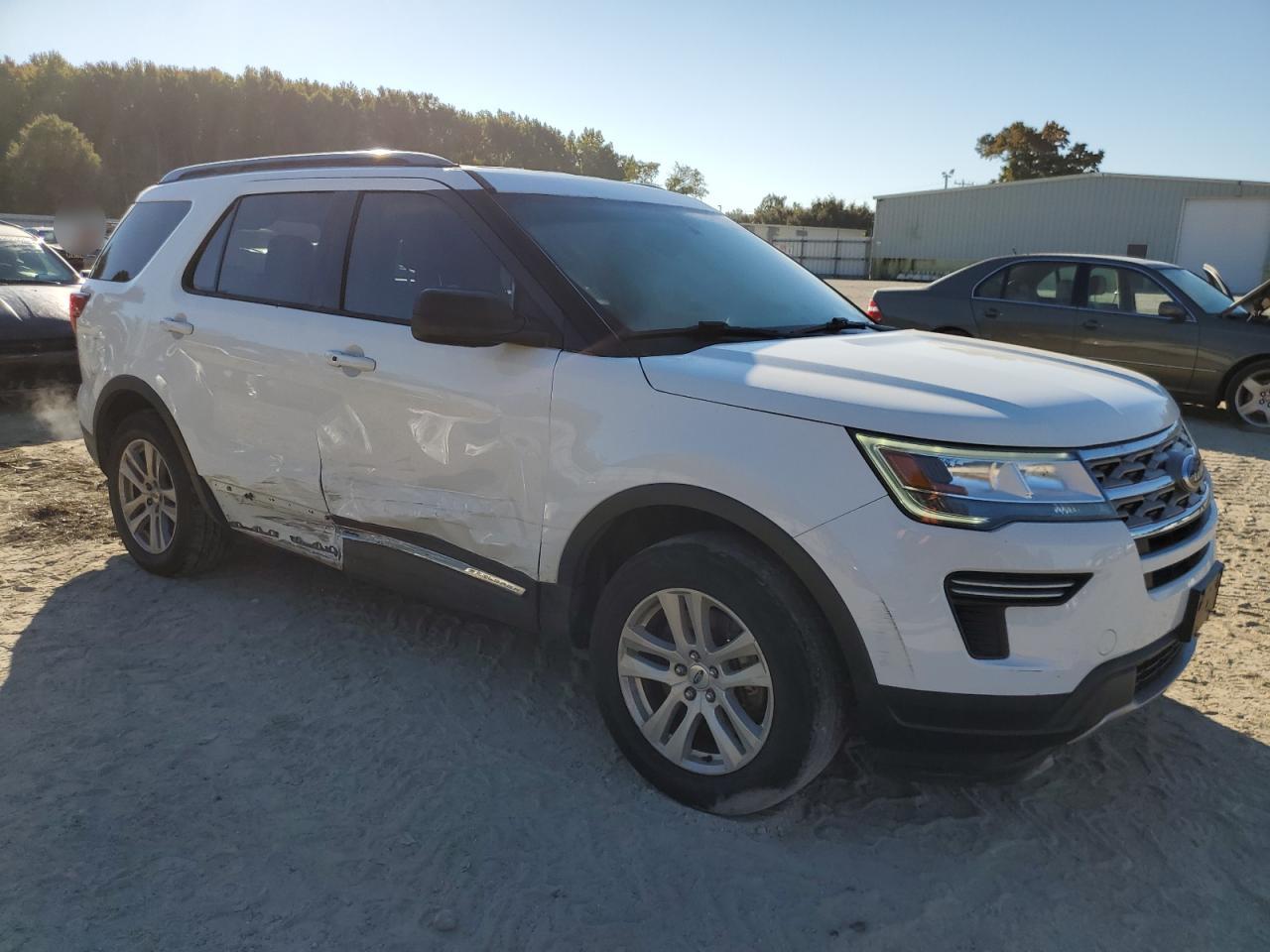 2018 Ford Explorer VIN 1FM5K8D89JGA75606 Copart auction photo, side / minor dent/scratches damage thumbnail 4