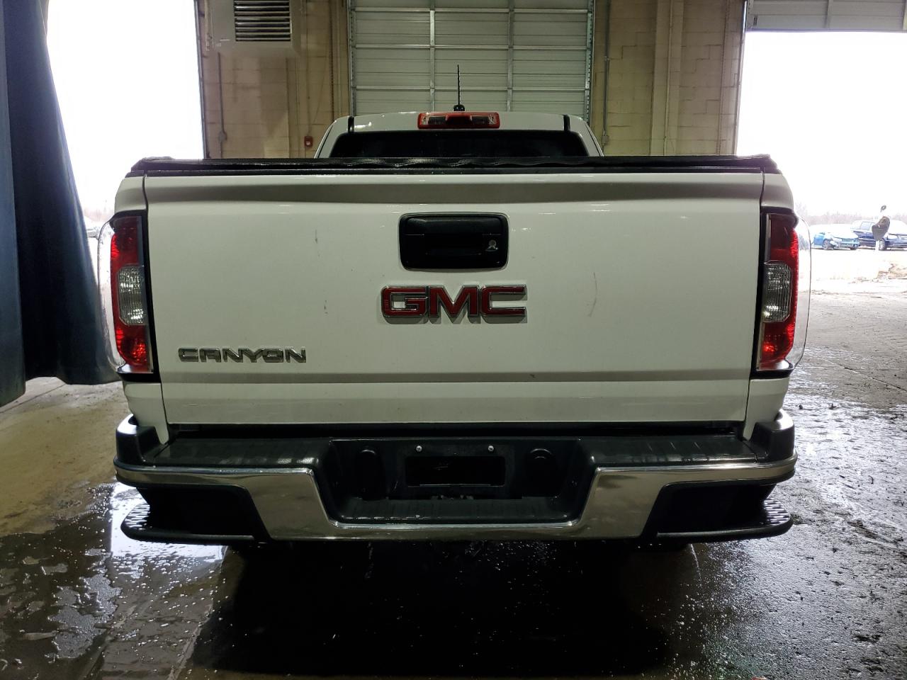 2015 GMC Canyon VIN 1GTH6AEA7F1163952 Copart auction photo, minor dent/scratches / mechanical damage thumbnail 6