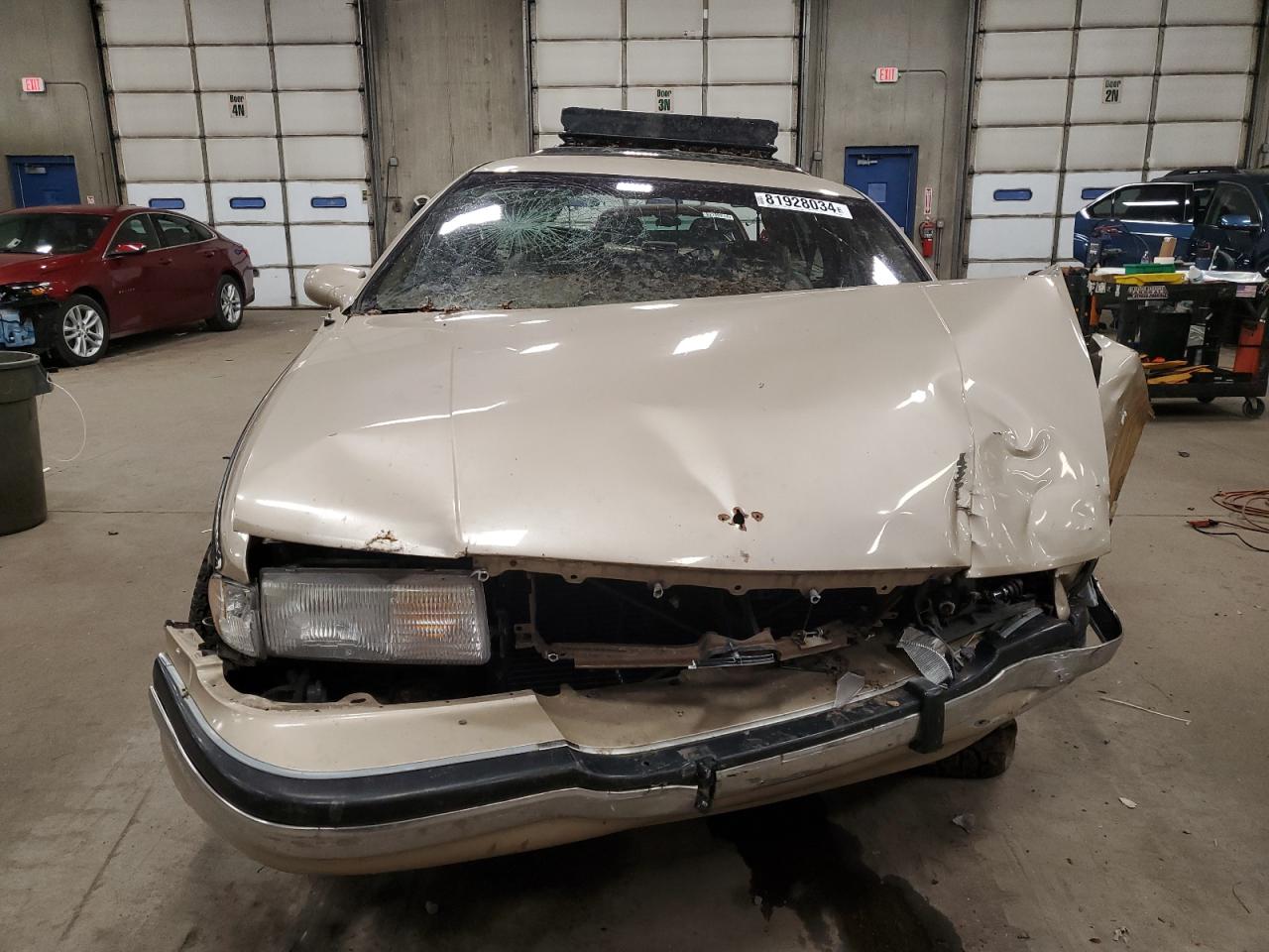 1996 Buick Roadmaster VIN 1G4BR82P9TR415630 Copart auction photo, all over damage thumbnail 5