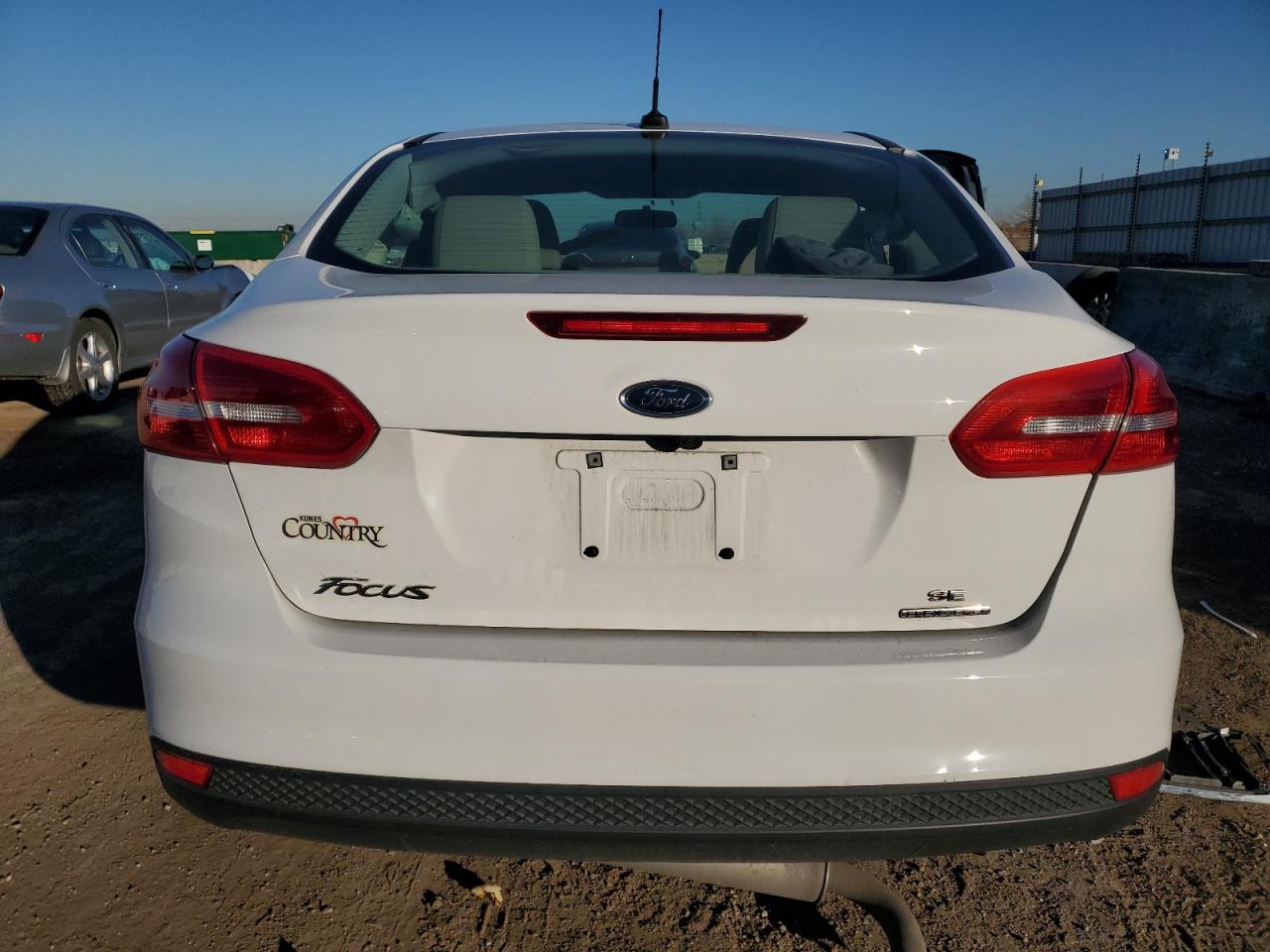 2016 Ford Focus VIN 1FADP3F23GL204958 Copart auction photo, side / rear end damage thumbnail 6