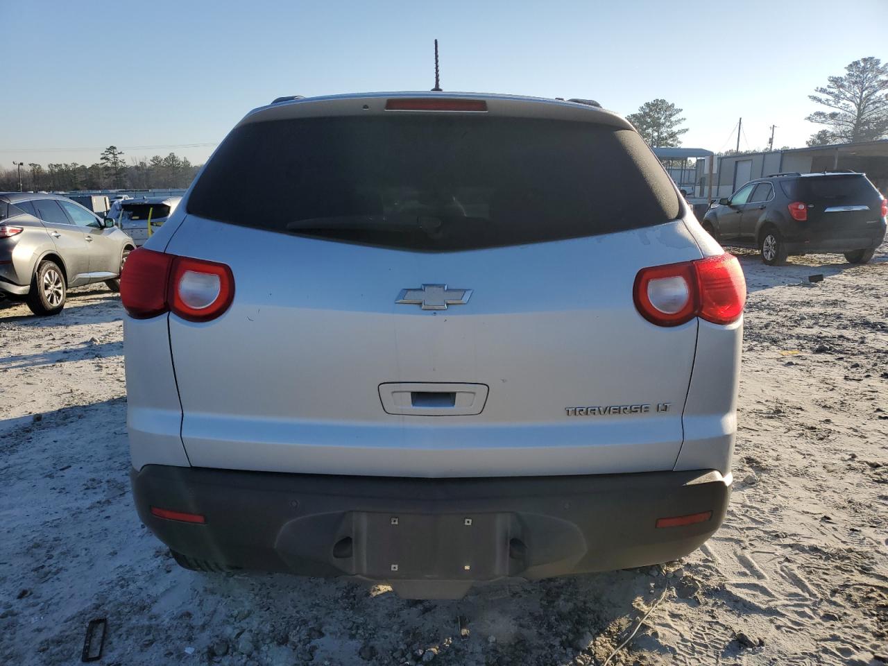 2010 Chevrolet Traverse VIN 1GNLRFEDXAS141544 Copart auction photo, front end / side damage thumbnail 6