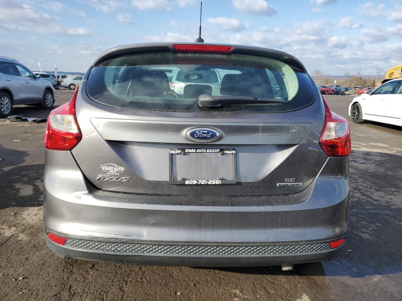 2014 Ford Focus VIN 1FADP3K20EL458355 Copart auction photo, side / front end damage thumbnail 6