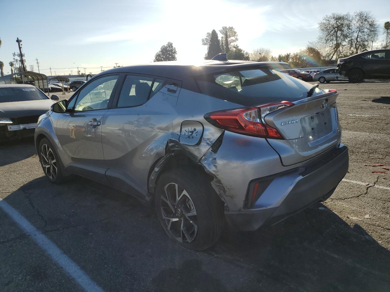 2020 Toyota C-HR VIN JTNKHMBX5L1084944 Copart auction photo, side / minor dent/scratches damage thumbnail 2