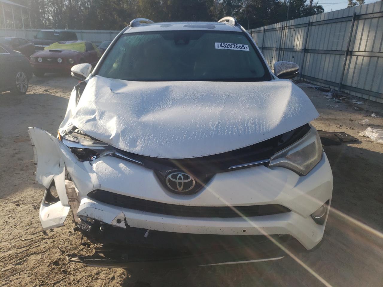 2017 Toyota RAV 4 VIN 2T3YFREV3HW337649 Copart auction photo, front end damage thumbnail 5