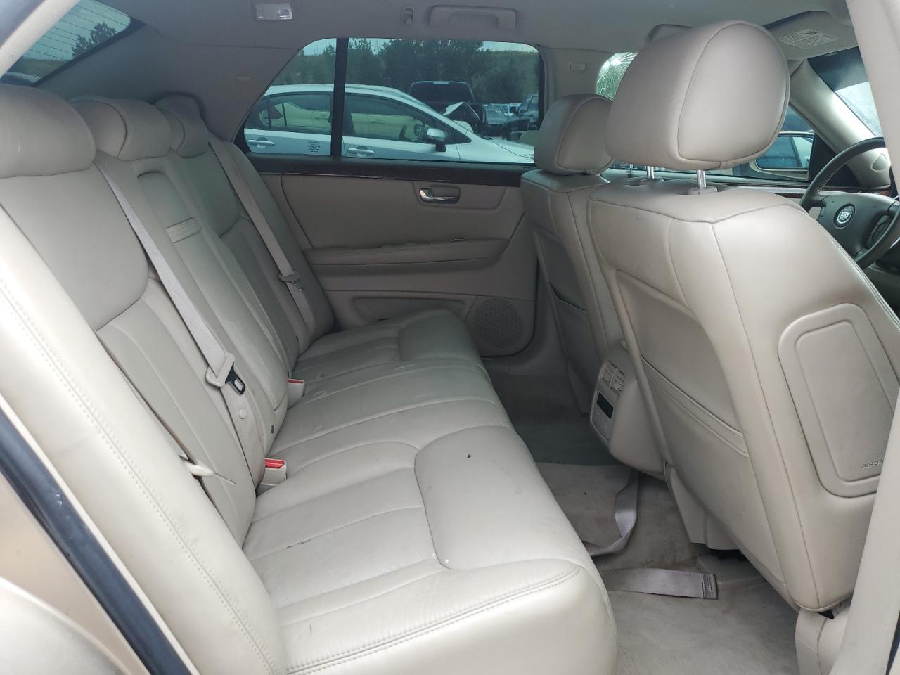 2006 Cadillac DTS VIN 1G6KD57Y36U100412 Copart auction photo, front end / side damage thumbnail 10