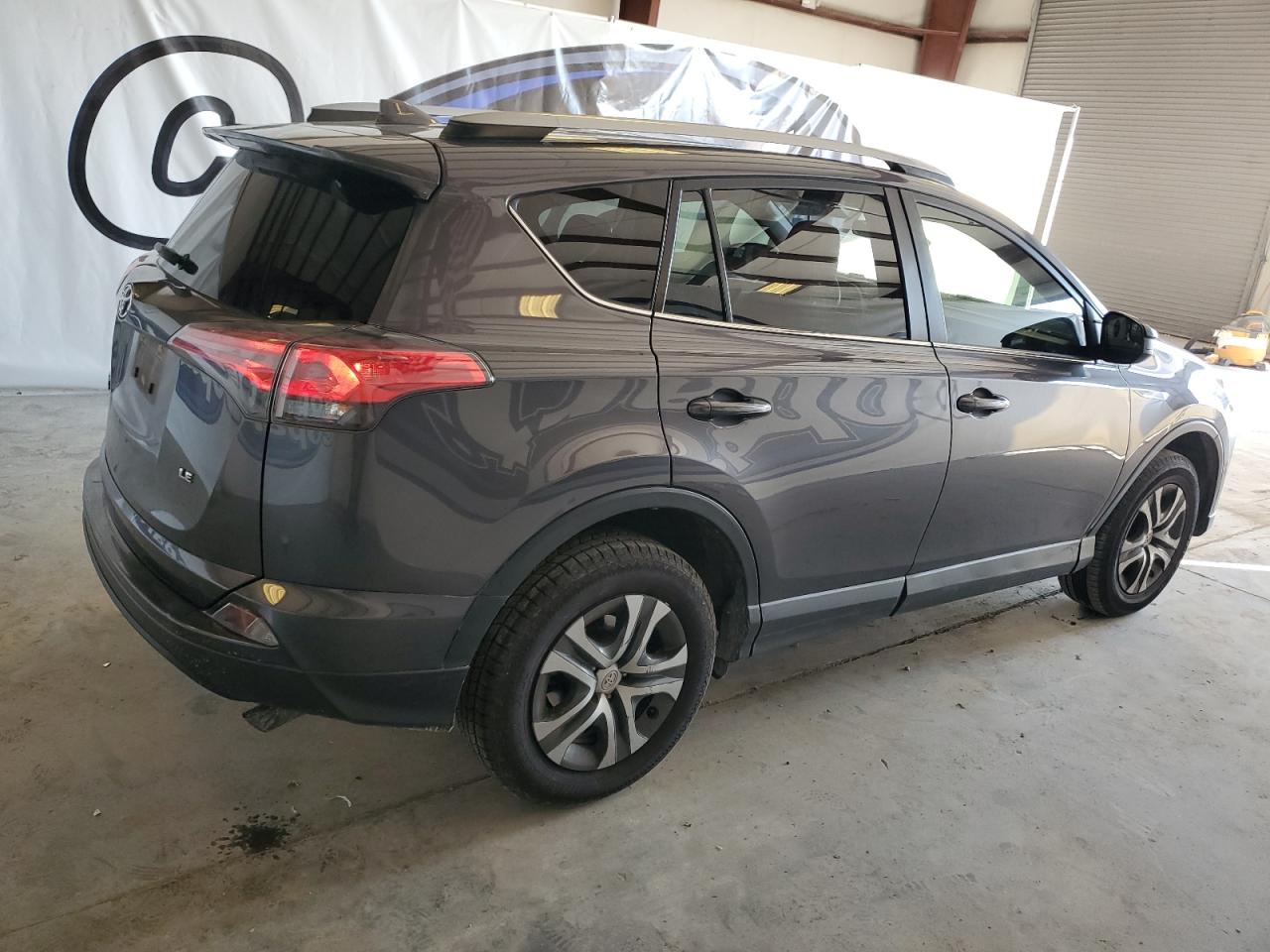 2018 Toyota RAV 4 VIN JTMZFREV4JJ753413 Copart auction photo, all over damage thumbnail 3