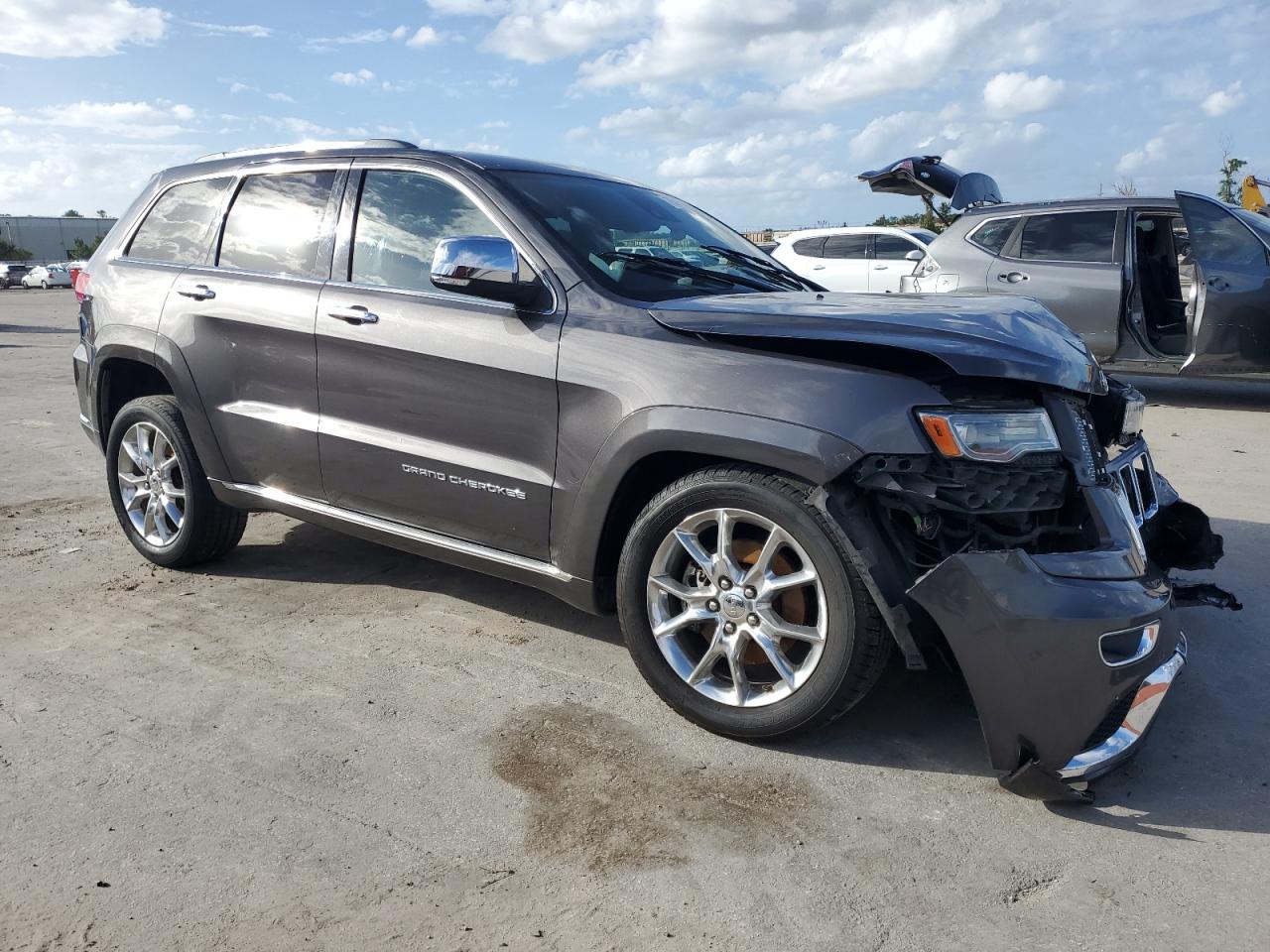 2014 Jeep Grand Cherokee VIN 1C4RJFJT3EC308964 Copart auction photo, front end / side damage thumbnail 4