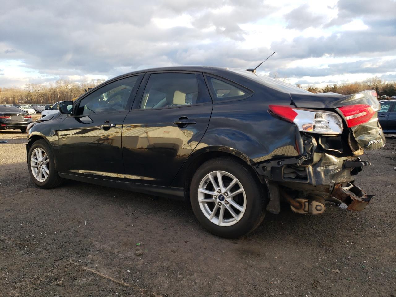 2015 Ford Focus VIN 1FADP3F20FL229198 Copart auction photo, all over damage thumbnail 2