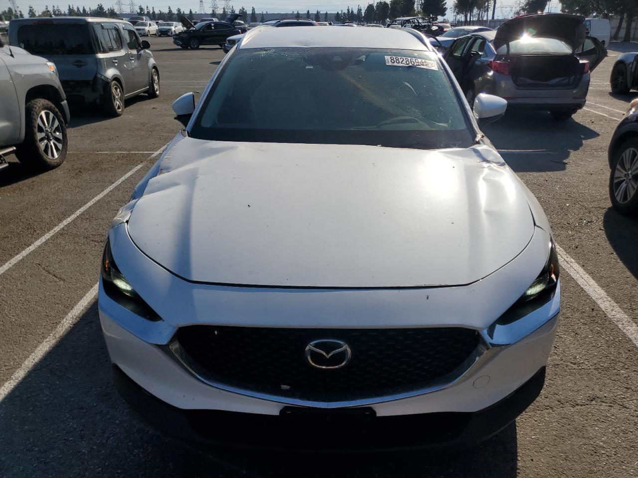 2023 Mazda CX-30 VIN 3MVDMBCM2PM561791 Copart auction photo, all over damage thumbnail 5