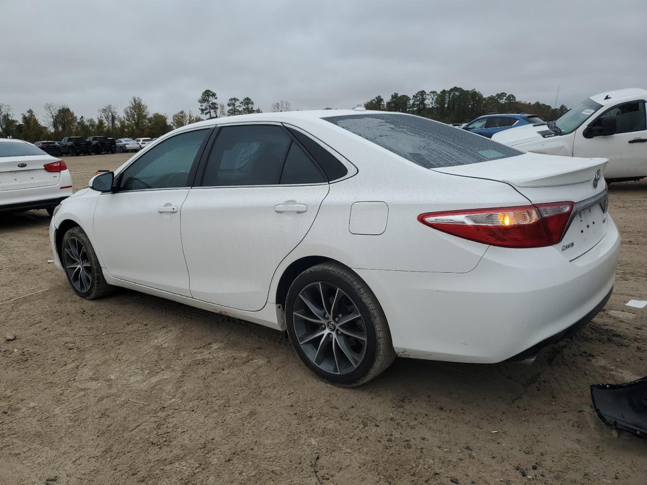 2016 Toyota Camry VIN 4T1BK1FK5GU569779 Copart auction photo, side damage thumbnail 2