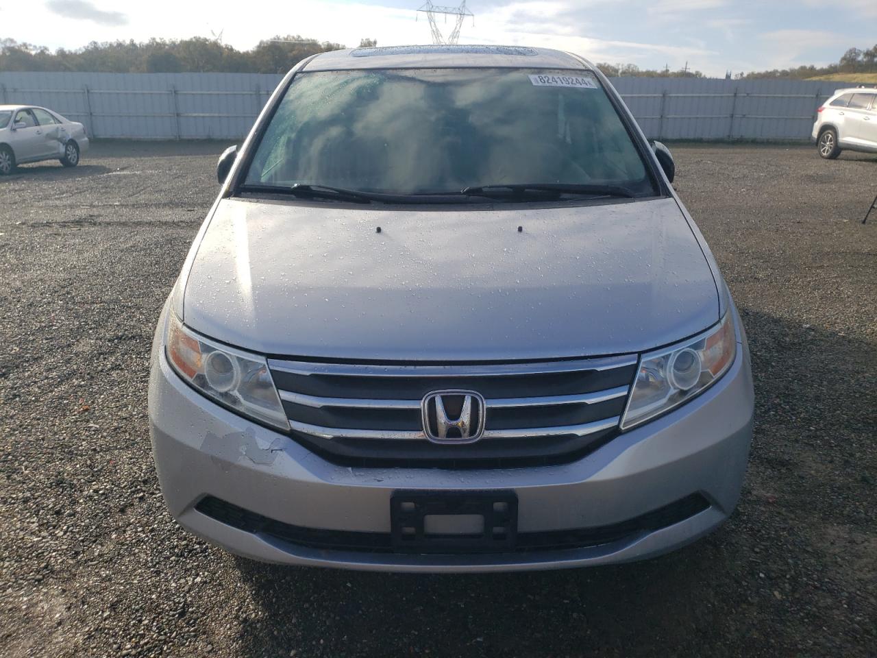 2012 Honda Odyssey VIN 5FNRL5H61CB017948 Copart auction photo, side / rear end damage thumbnail 5