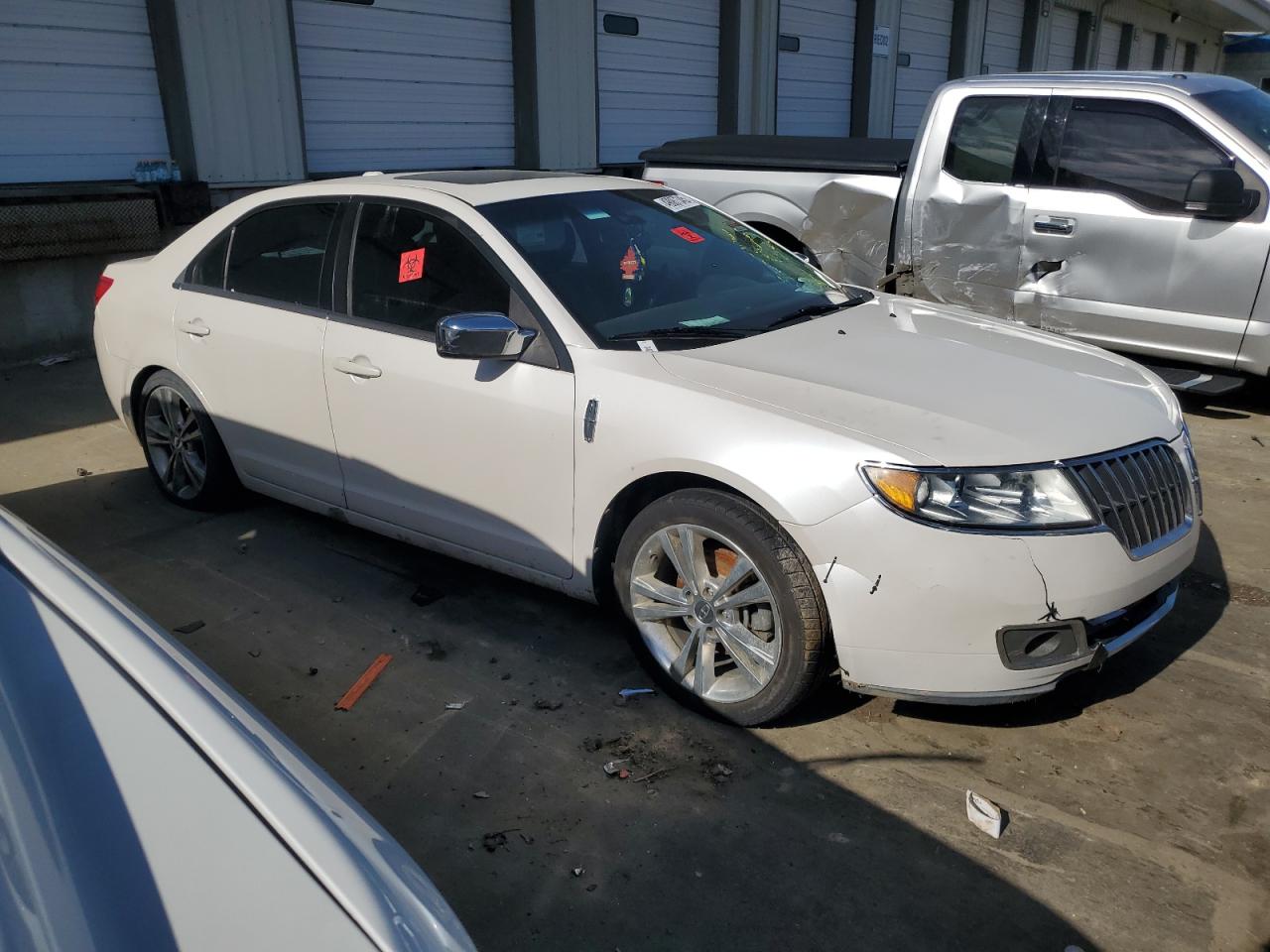 2012 Lincoln MKZ VIN 3LNHL2GC3CR816111 Copart auction photo, burn - interior damage thumbnail 4