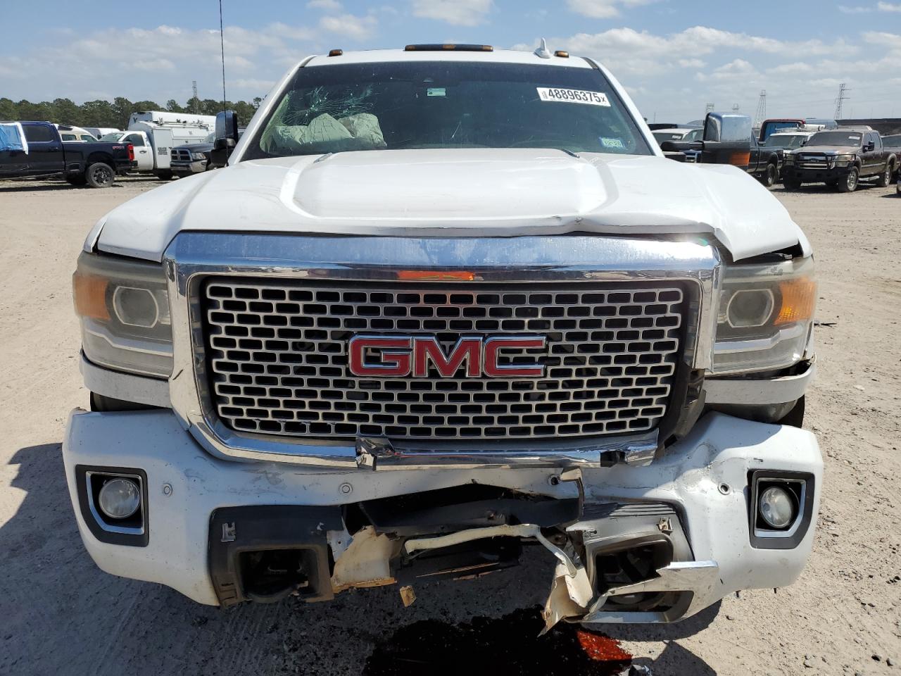 2016 GMC Sierra VIN 1GT42YE81GF212695 Copart auction photo, front end / minor dent/scratches damage thumbnail 5