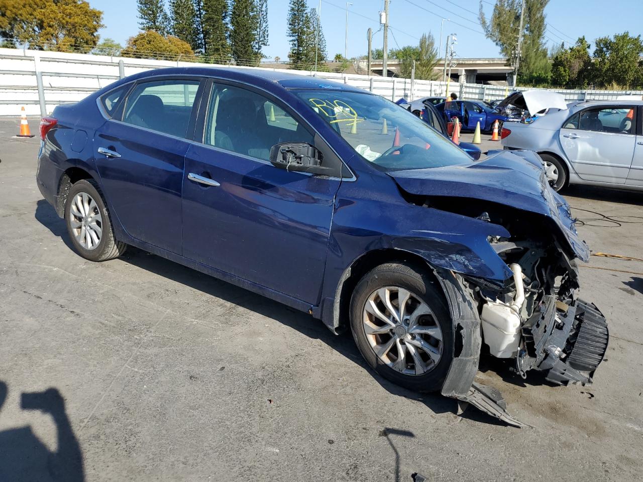 2019 Nissan Sentra VIN 3N1AB7AP5KY309395 Copart auction photo, front end / side damage thumbnail 4