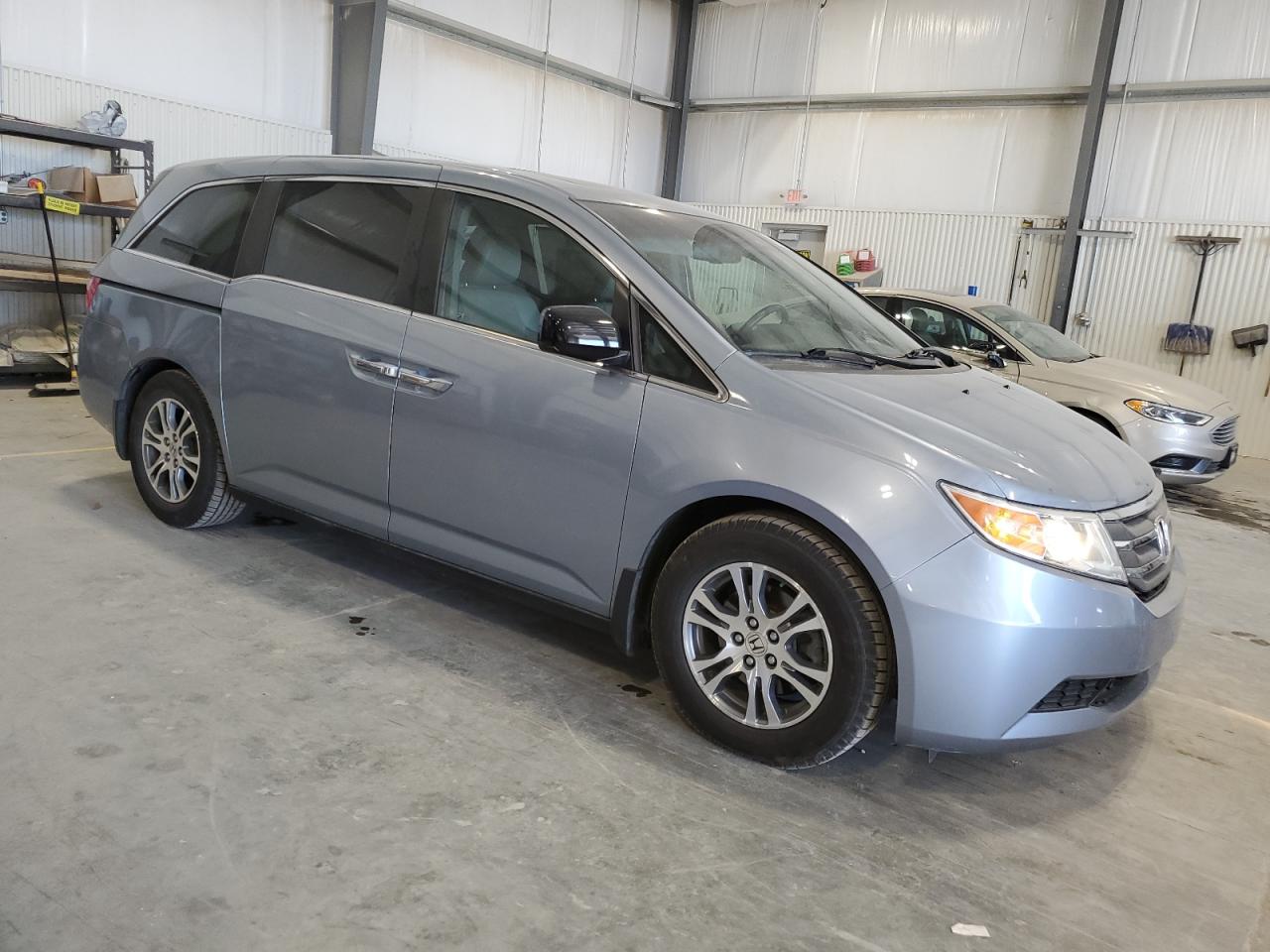 2011 Honda Odyssey VIN 5FNRL5H60BB041978 Copart auction photo, front end damage thumbnail 4