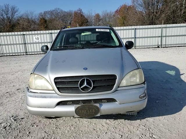 2000 Mercedes-Benz M-klasse VIN 4JGAB54E9YA177973 Copart auction photo, all over damage thumbnail 11