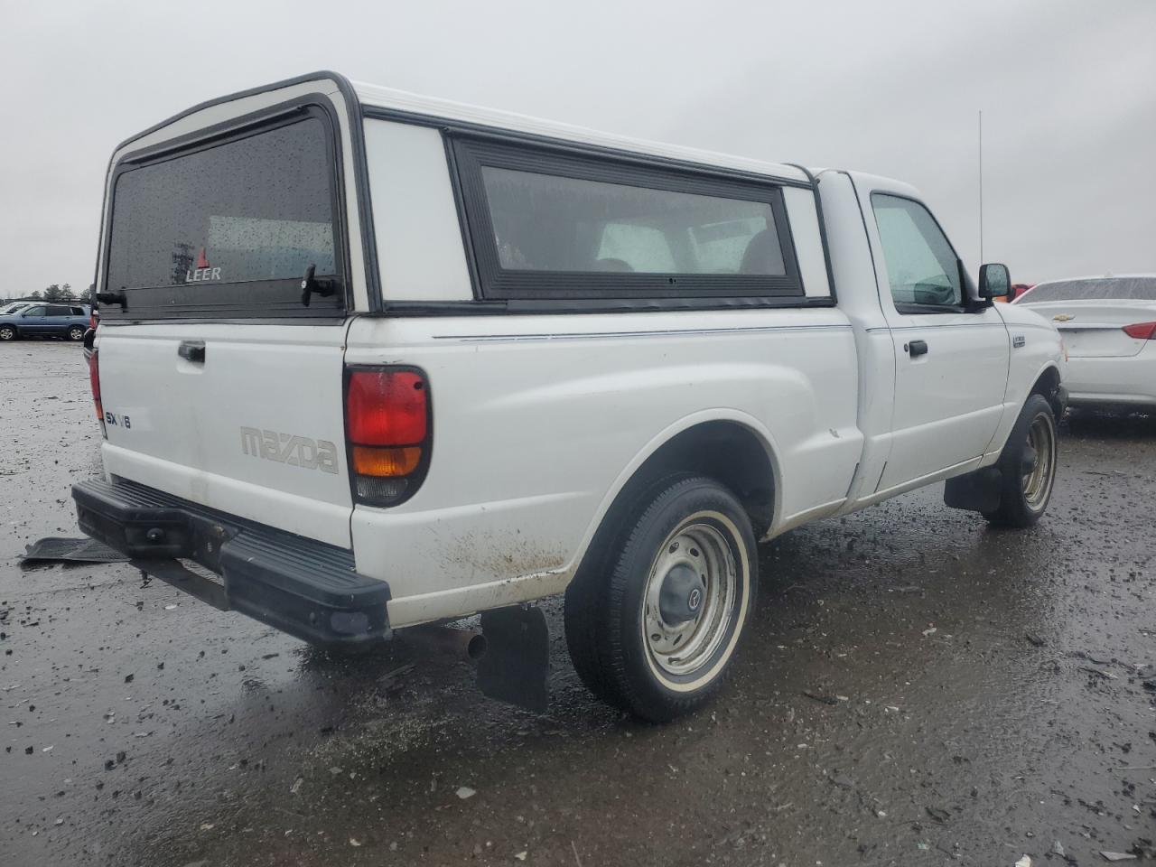 2000 Mazda B-series VIN 4F4YR12V7YTM31122 Copart auction photo, front end / side damage thumbnail 3