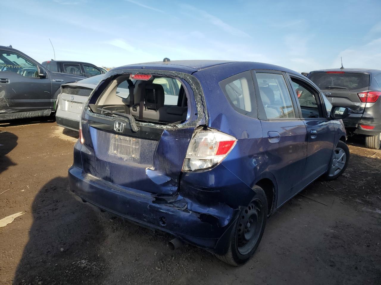 2012 Honda Fit VIN JHMGE8H38CC033682 Copart auction photo, rear end / minor dent/scratches damage thumbnail 3