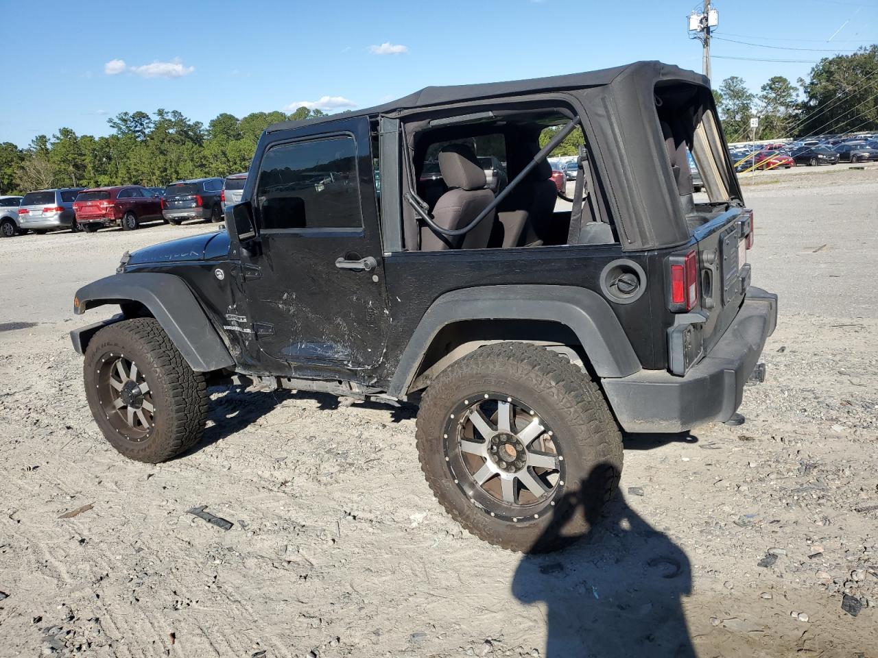 2016 Jeep Wrangler VIN 1C4AJWAG4GL323282 Copart auction photo, side damage thumbnail 2